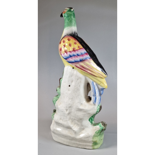 1 - 19th century Staffordshire Pottery model of a Roc Bird, on naturalistic base. 32.5cm high approx. (B... 