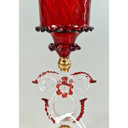 23 - Murano ruby ground writhen Tipetto glass goblet. 20.5cm high approx.  (B.P. 21% + VAT)