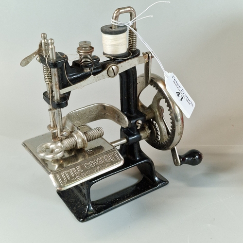 41 - Little Comfort improved hand sewing machine, in original box with instruction leaflets etc. 13cm  lo... 