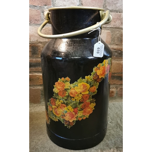 610 - A vintage brass and aluminium churn with swing handle overall decorated with printed flowers and fol... 