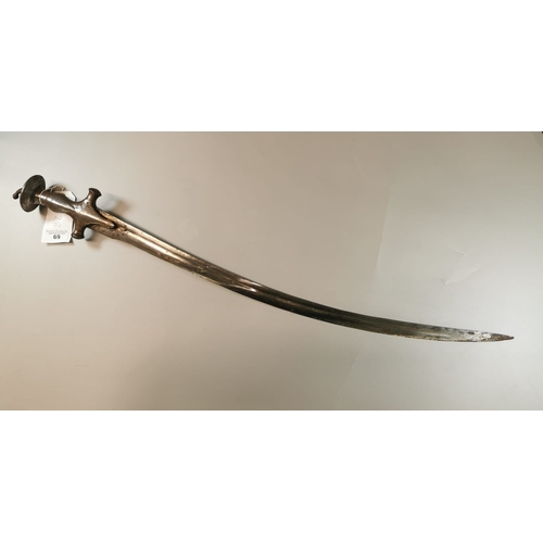 69 - Indian Tulwar ceremonial sword with curved single edged fluted blade and steel hilt with mushroom po... 