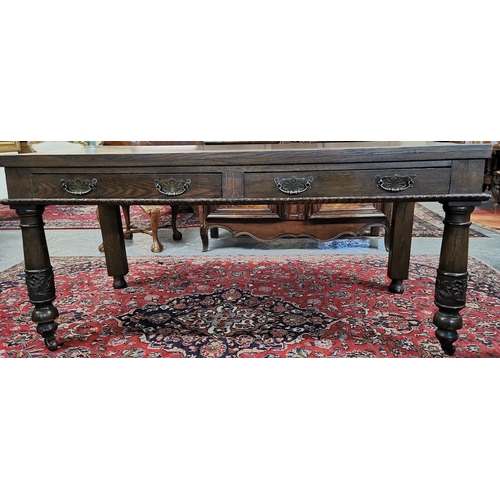 17 - Early 20th century stained oak side/serving table, having two frieze drawers to one side and standin... 