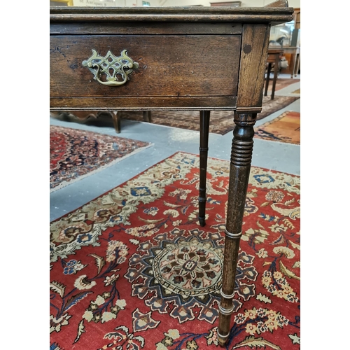 18 - Early 19th century mahogany side table/writing desk, the moulded gallery top above two drawers, stan... 