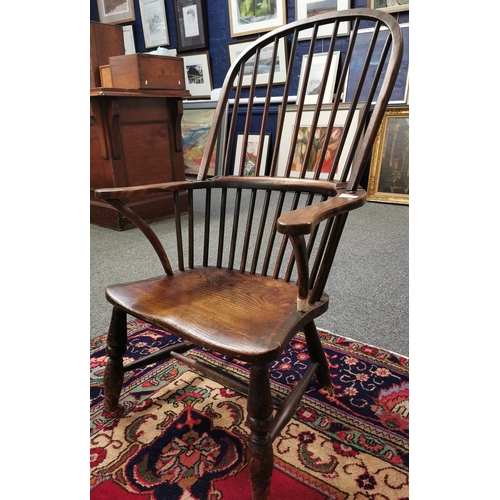 31 - 19th century, elm ash and beech stick back Windsor armchair, having solid seat on baluster turned le... 