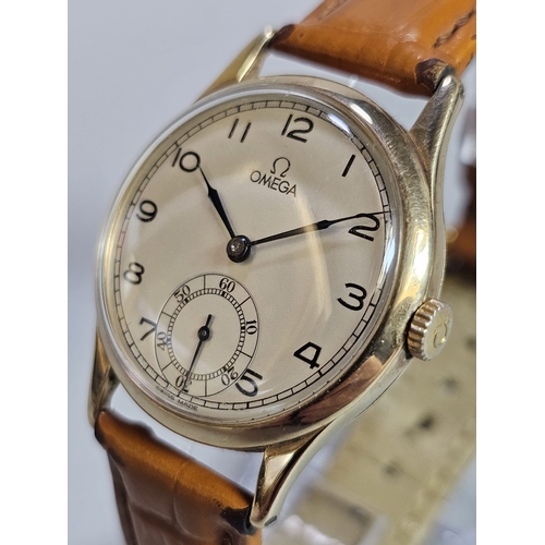 462 - 9ct gold mid century gentleman's Omega wristwatch, having satin face with Arabic numerals and second... 