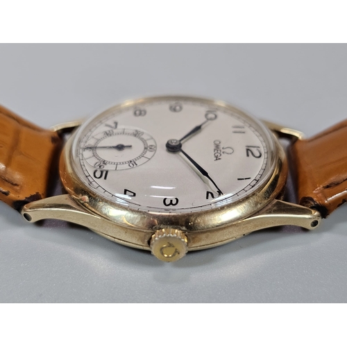 462 - 9ct gold mid century gentleman's Omega wristwatch, having satin face with Arabic numerals and second... 