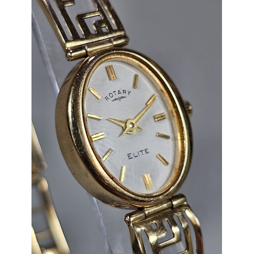 466 - 9ct gold Rotary Elite oval ladies' bracelet wristwatch, with cream face having Baton numerals on a g... 