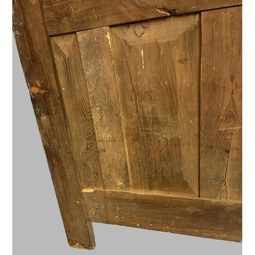 6 - 19th century French oak armoire, the moulded cornice above two blind panelled doors with fielded orn... 