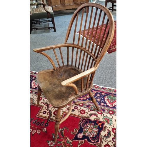 32A - 19th century, elm and ash spindle back Windsor armchair, the elm moulded seat on crinoline stretcher... 