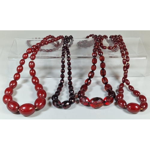 342 - Collection of vintage cherry Bakelite and cherry amber type faceted beaded graduated necklaces. 254g...