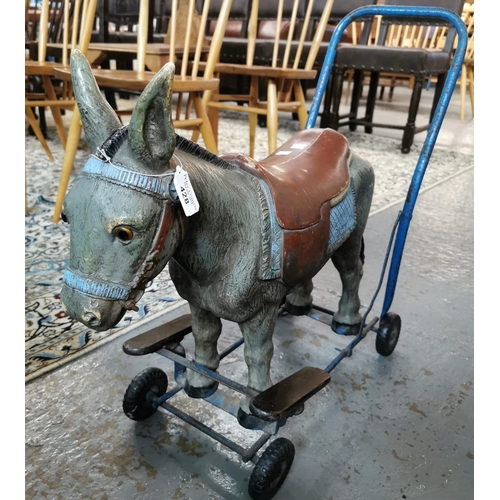 Tri-Ang push along child's donkey on wheels. (B.P. 21% + VAT)