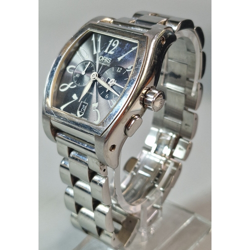 An Oris Automatic Tonneau World Timer Chronograph stainless steel gents wristwatch with black dial in original box with papers etc. (B.P. 21% + VAT)