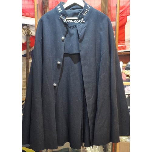 British Police Officers' black cape with chain fastener. Collar ...