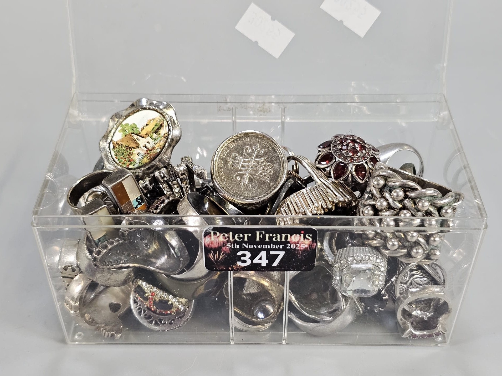 Large collection of silver and white metal and other dress rings ...