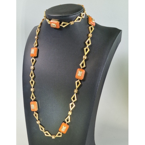 207 - 14ct gold (marked 585) necklace, of repeating geometric designs with coral and diamond accents, toge...
