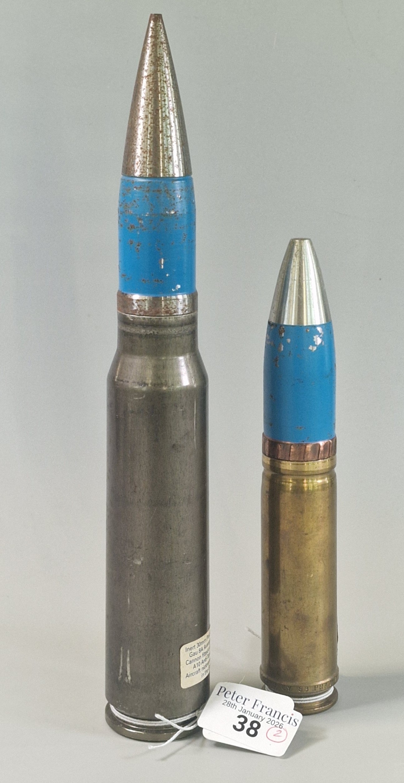 Two inert practice shells to include: 30mm Aden cannon shell and 30mm ...