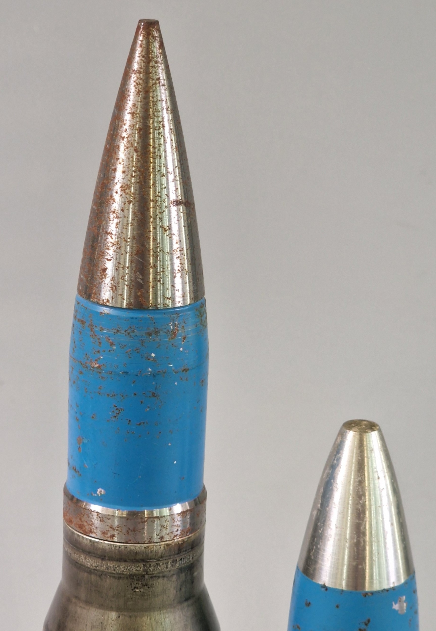Two inert practice shells to include: 30mm Aden cannon shell and 30mm ...