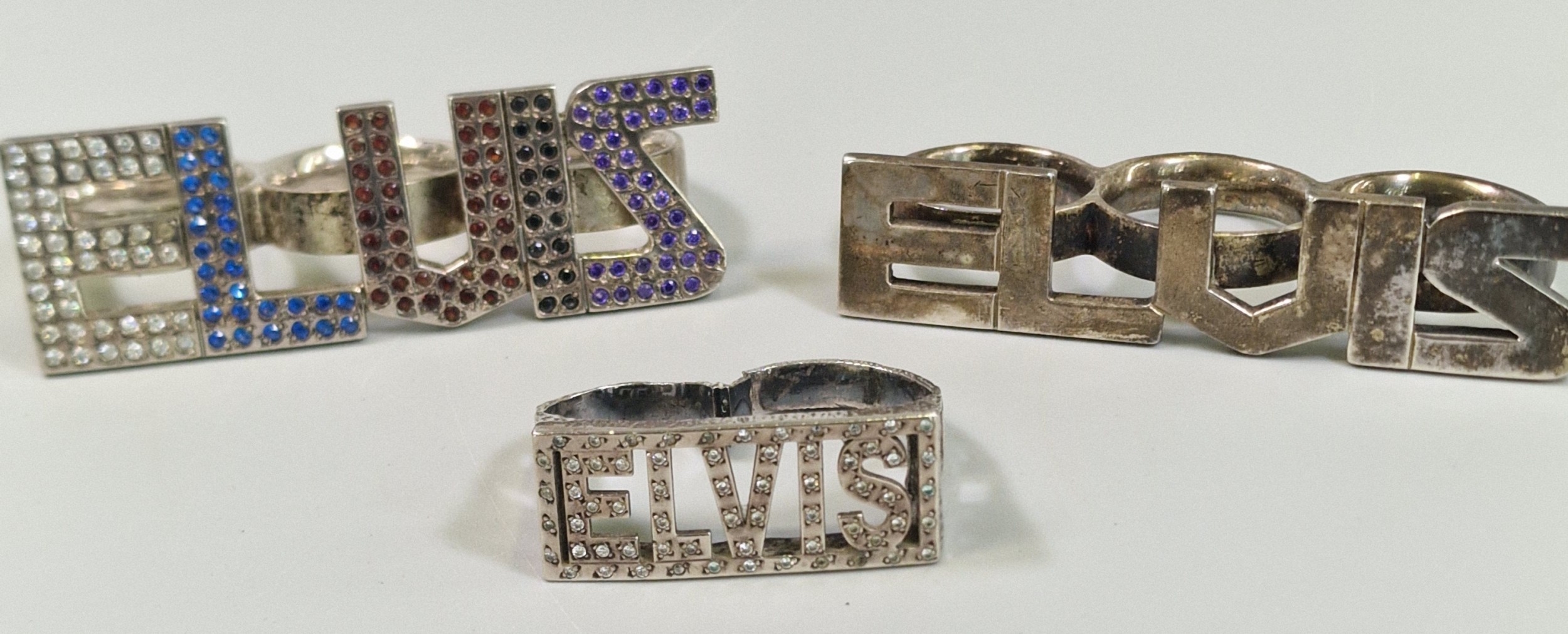 Collection of Elvis Presley jewellery to include 'Elvis' silver three ...