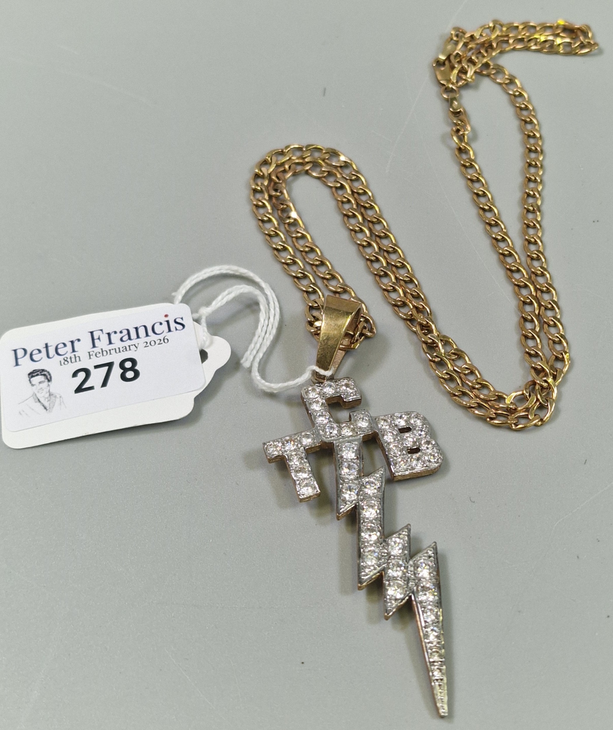 9ct gold curb-link chain with TCB Elvis Presley pendant. The chain 60cm ...
