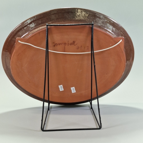 James Campbell (1942 - 2019), an earthenware platter featuring a ...