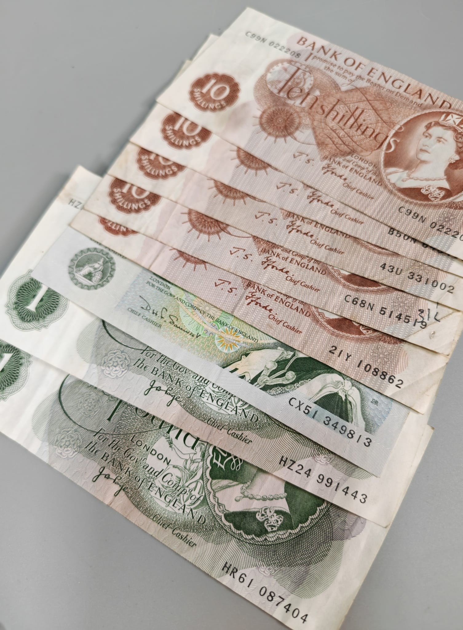 Small collection of coins and bank notes to include: 10 Shilling notes ...