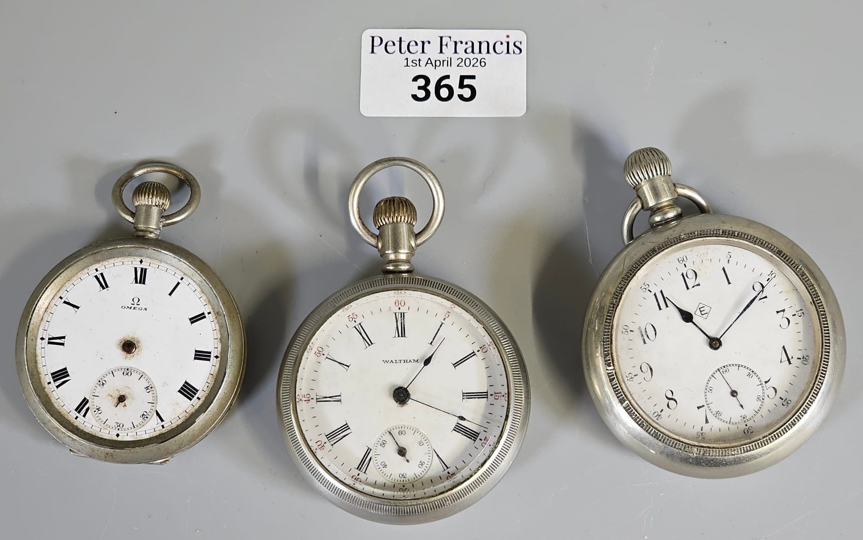 Three white metal keyless lever open faced pocket watches. (3) (B.P. 21 ...