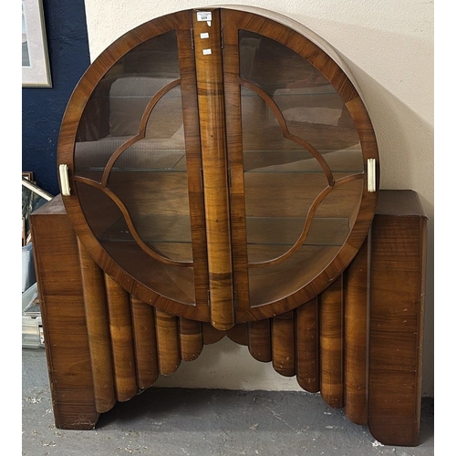 609 - Art Deco design veneered walnut Bullseye cabinet with Bakelite handles. (B.P. 21% + VAT)