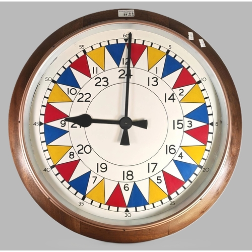 WW2 British Royal Observer Corps (ROC) Sector clock, from Carmarthen Barracks (Southern Sector, No. 13 Group), the 46cm painted dial with alternating inward-facing red, yellow and blue sector triangles, black Roman numerals and inner 24-hour chapter ring. Used in operations rooms for plotting and tracking aircraft movements during the Second World War. Housed in a circular mahogany case, stamped verso ‘6 DCA 61/3’, with electric movement. Overall diameter approx. 57cm. (B.P. 21% + VAT)