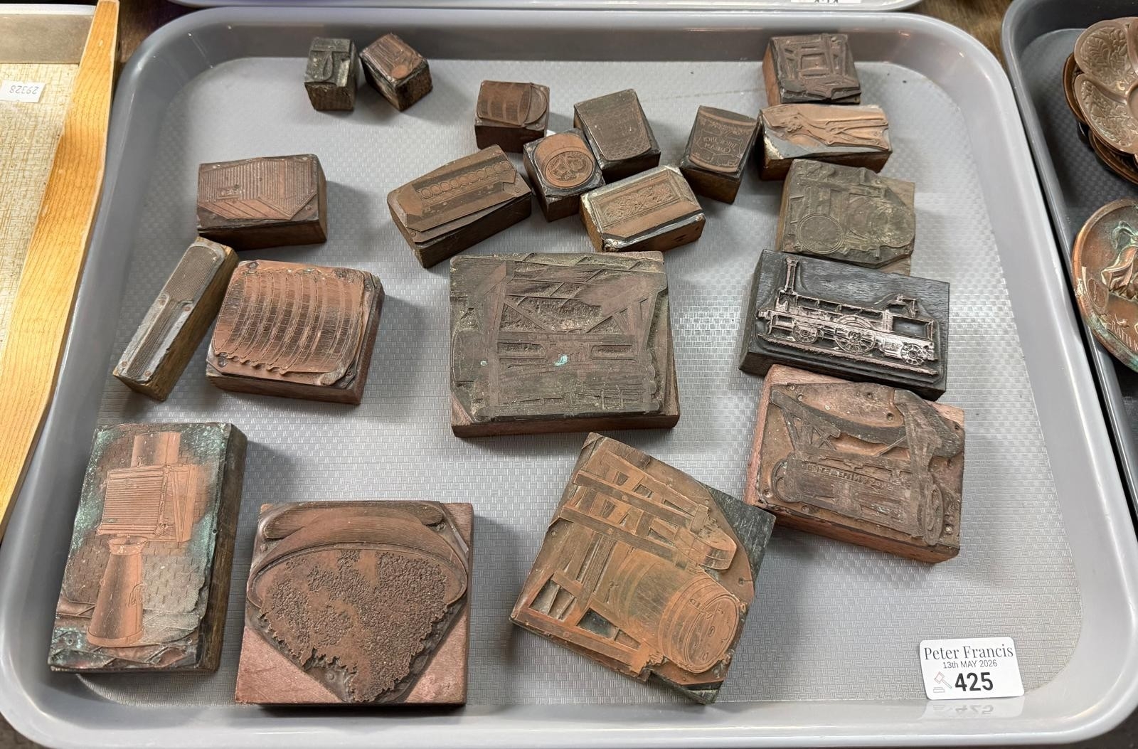 Collection of vintage printing blocks with varying designs including ...
