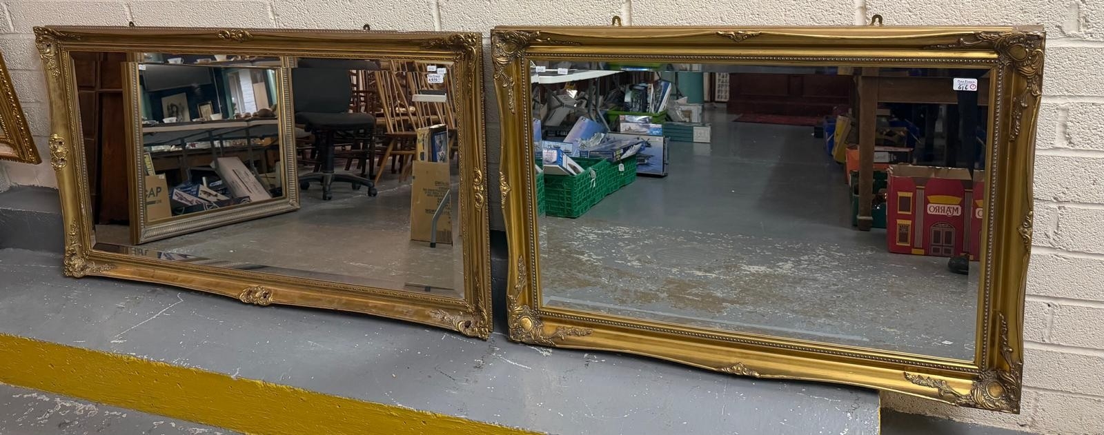 Modern gilt framed rectangular mirror with bevelled plate. Overall ...