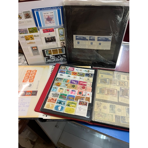 324 - 6 STAMP ALBUMS AND FOLDER OF ISREAL STAMPS