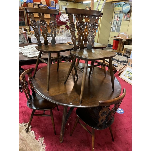 204 - ERCOL ROUND TABLE WITH 7 ERCOL FLEUR DE LYS CHAIRS 4FT DIAMETER 2.4FT HIGH