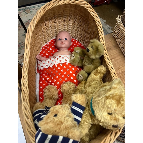 18 - VINTAGE CHILDS WICKER BASKET CRADLE WITH DOLL AND VINTAGE TEDDIES