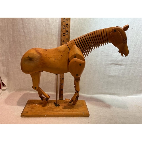 228 - ARTISTS ARTICULATED WOODEN HORSE