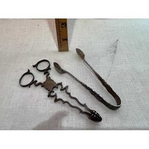 313 - PAIR SHM SUGAR TONGS AND CANDLESNUFFER