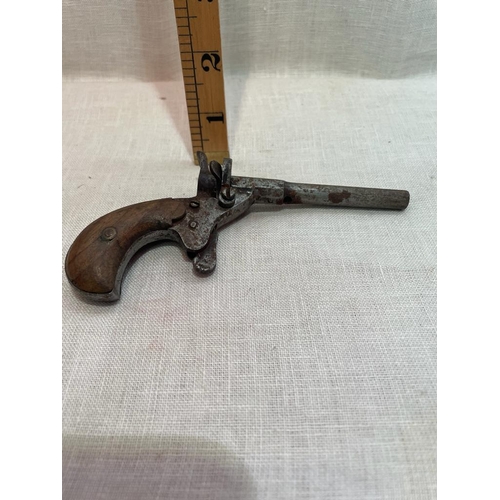 348 - SMALL ANTIQUE PISTOL