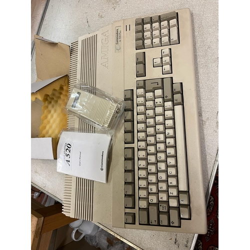 32 - AMIGA COMMADORE A-500 PLUS WITH ADAPTOR