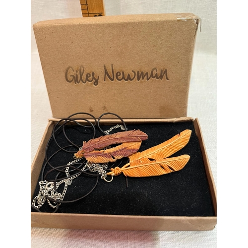 391 - GILES NEWMAN HAND CRAFTED WOOD FEATHERS