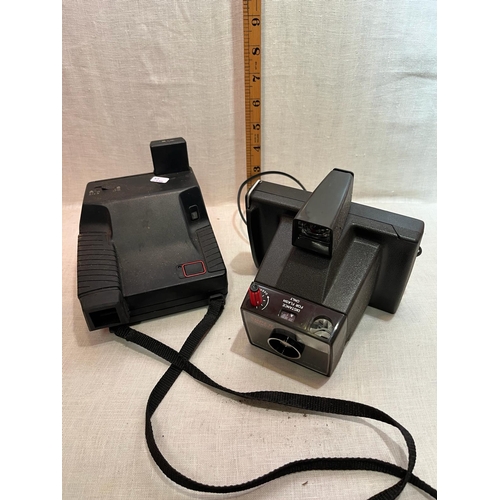 401 - 2 POLAROID CAMERAS