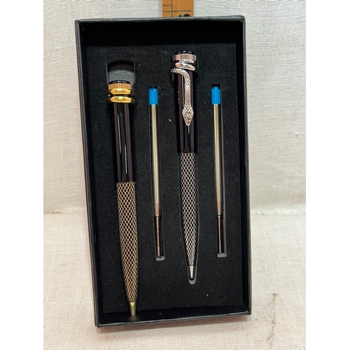 212 - GOLD AND SILVER PLATED SNAKE PEN SET