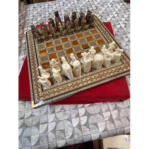 283 - CASED CARVED CHESS SET AND BOARD