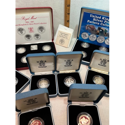 374 - 13 CASED SILVER PROOF £1 COINS WITH CERTS