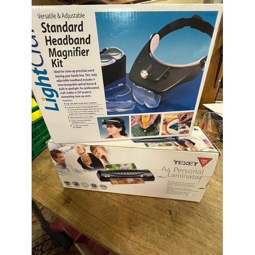 35 - BOXED HEADBAND MAGNIFIER AND LAMINATOR