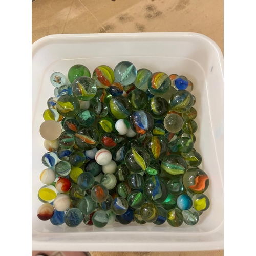 84 - TUB OF MARBLES