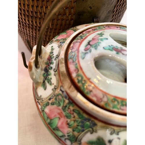 252 - ANTIQUE CHINESE TEAPOT IN BASKET