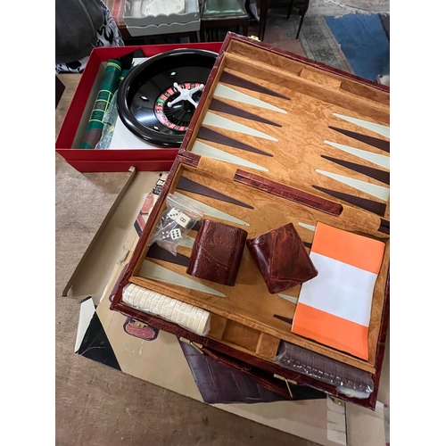 121 - CASED BACKGAMMON SET AND ROULETTE GAME