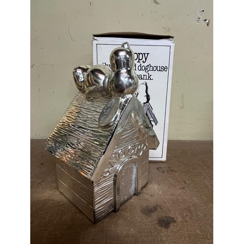 132 - SILVER PLATED SNOOPY MONEY BANK