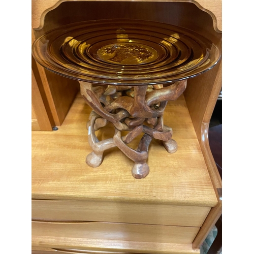 229 - AMBER GLASS TOP ON CARVED WOODEN BASE