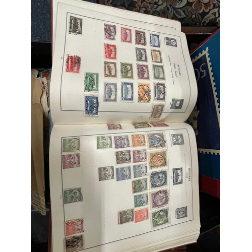 386 - SUITCASE OF STAMPS