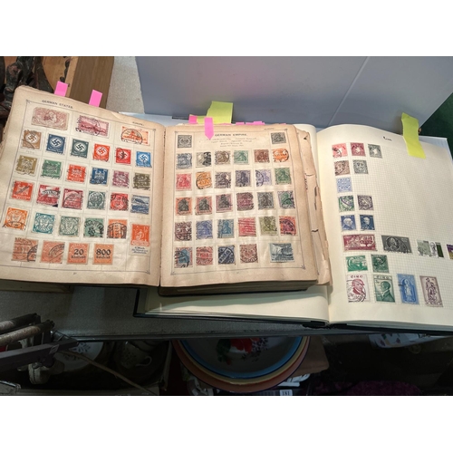 352 - 2 STAMP ALBUMS WITH EARLY STAMPS INC QUEEN VICTORIA